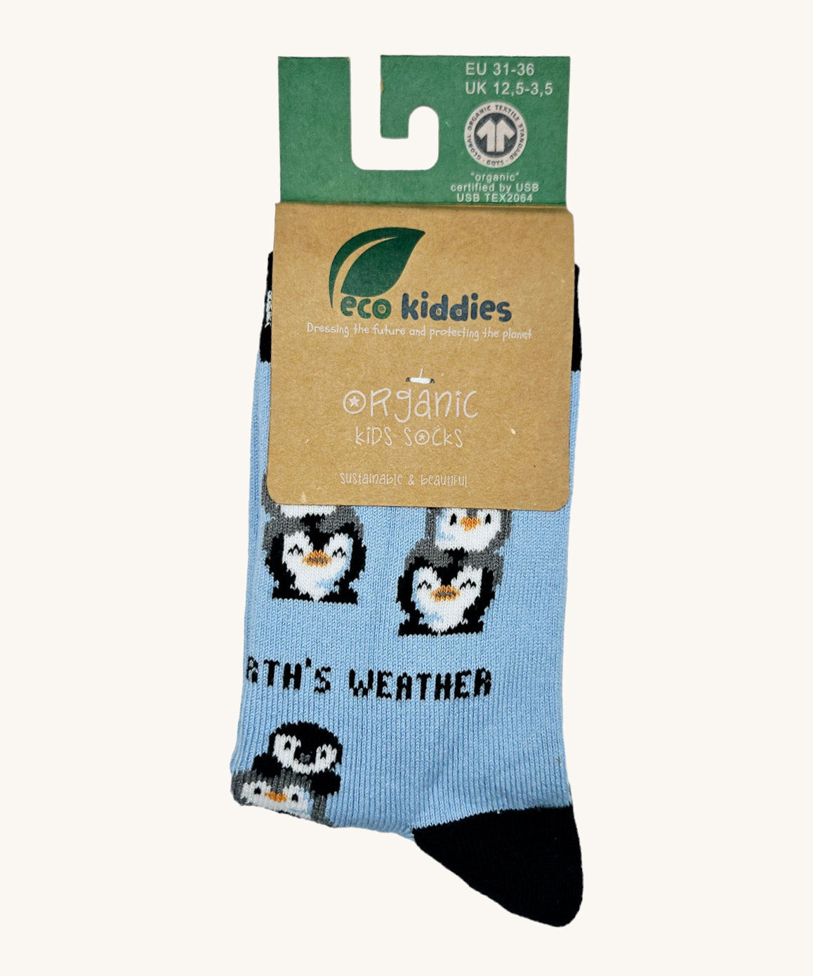 Eco kiddies friendly penguins organic cotton socks available at Babipur. A light blue sock with black detail and features a cute playful penguin design 