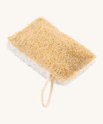 Ecoliving loofah kitchen sponge scrubber available at Babipur. A double sided scrubber, features a loofah side and a sponge side with a loop of thread for hanging. 