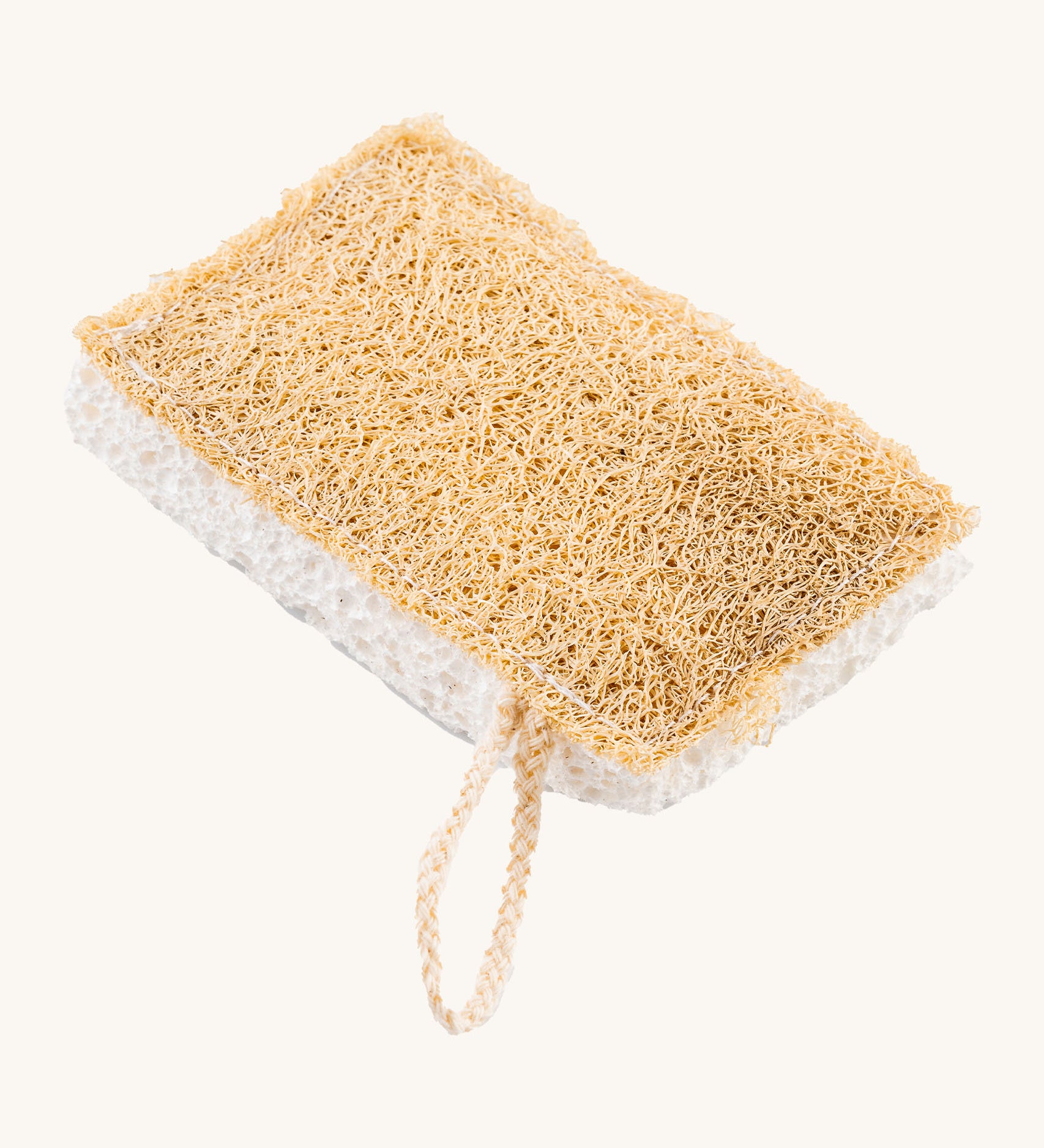 Ecoliving loofah kitchen sponge scrubber available at Babipur. A double sided scrubber, features a loofah side and a sponge side with a loop of thread for hanging. 