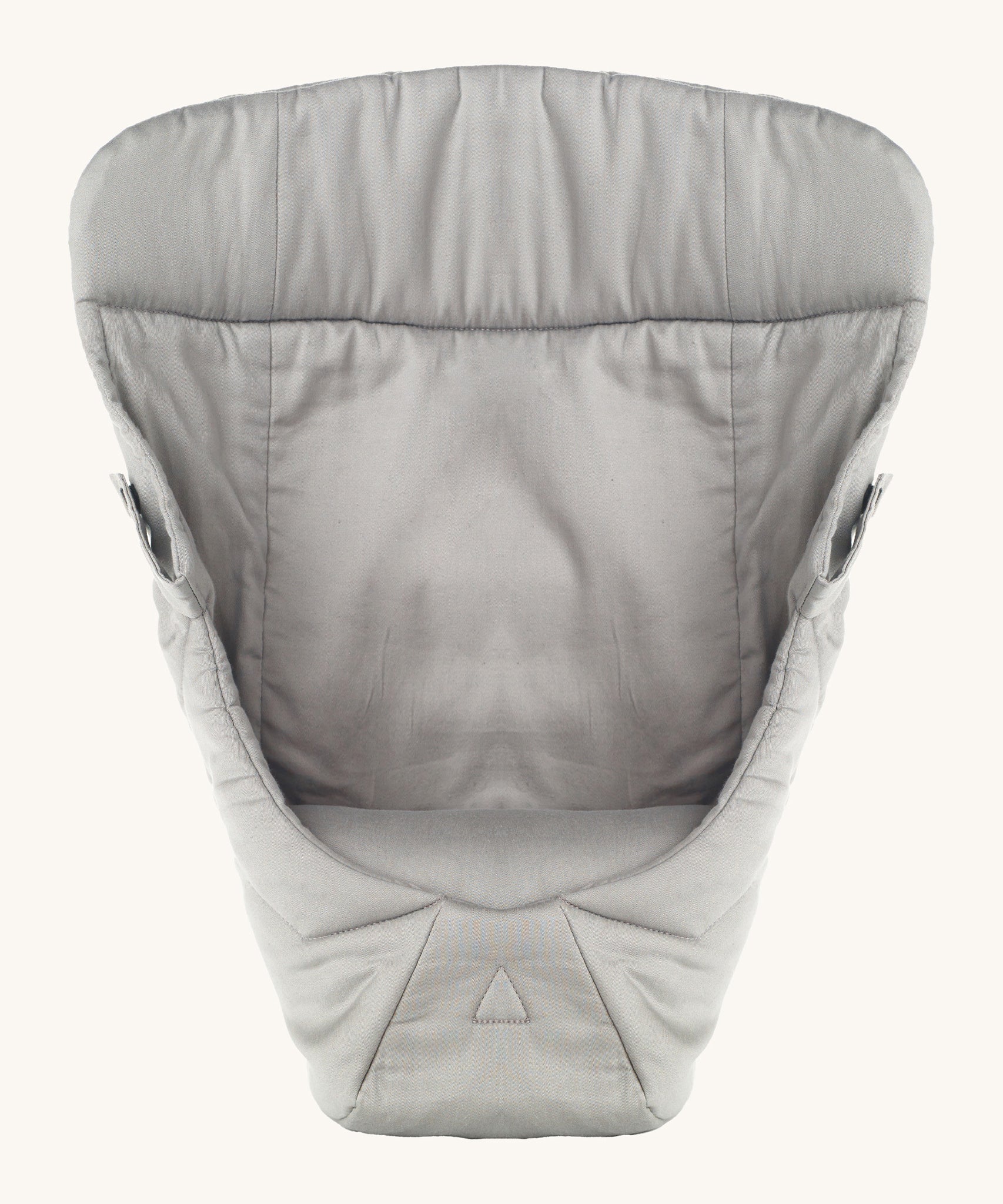 Ergobaby Baby Carrier insert in Grey, on a cream background. The image shows the Carrier Insert from the front with the seat cushion inside the insert
