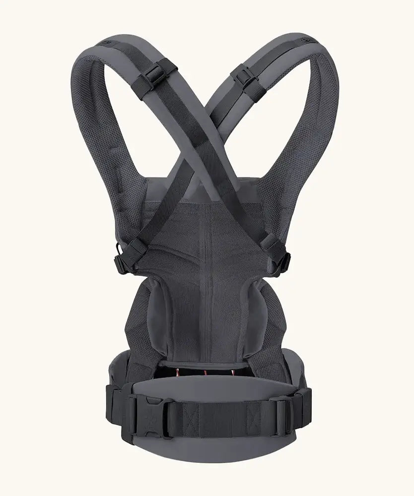 Back of Ergobaby omni 360 baby carrier in charcoal grey showing crossable straps configuration