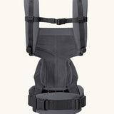 Back of Ergobaby omni 360 baby carrier in charcoal showing quick release buckle on shoulder straps 