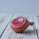 Erzi Gammon joint Wooden Play Food placed on a wooden surface. 