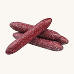 A closer look at the painted Erzi  Wooden Mini Salami, painted to resemble real salami. On a cream background