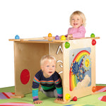 Children happily playing with the Erzi wall boards which are connected together to create a sensory and learning den
