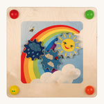 Erzi Sensory Weather Wall Board, showing a moveable sun, cloud and rain cogs, on a rainbow background