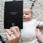 The Etta Loves Sensory Positive Affirmation Flash Cards, showing the Affirmation side of the card. The card reads "I am enough, always" and a baby is laying down looking at the visual side