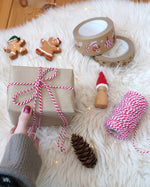 Gift wrapped in Everlasto Beefeater Red baker’s cotton twine, featuring red and white stripes for Christmas crafts and gift wrapping - available now at Babipur.