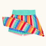 Frugi Alba skort in rainbow stripes with a mint green waistband showing the shorts underneath