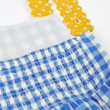 Frugi 100% organic cotton dress in blue and white gingham showing yellow shoulder strap and elasticated back panel