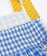 Frugi 100% organic cotton dress in blue and white gingham showing yellow shoulder strap and elasticated back panel