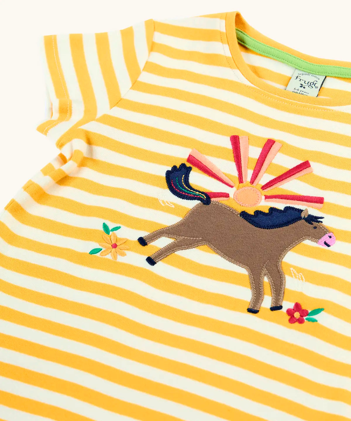Frugi 100% organic cotton short sleeve t-shirt in yellow and white stripe with jumping horse patch on the front and yellow collar trim