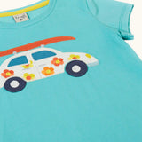 Frugi 100% organic cotton short sleeve t-shirt in light blue laid flat showing  white car patch carrying a surfboard on the front