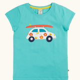 Frugi 100% organic cotton short sleeve t-shirt in light blue with white car patch carrying a surfboard on the front