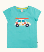 Frugi 100% organic cotton short sleeve t-shirt in light blue with white car patch carrying a surfboard on the front