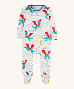 Frugi easy dressing printed babygrow in dragon skies available at Babipur. A GOTS organic cotton all in one in white with a flying green dragon design.