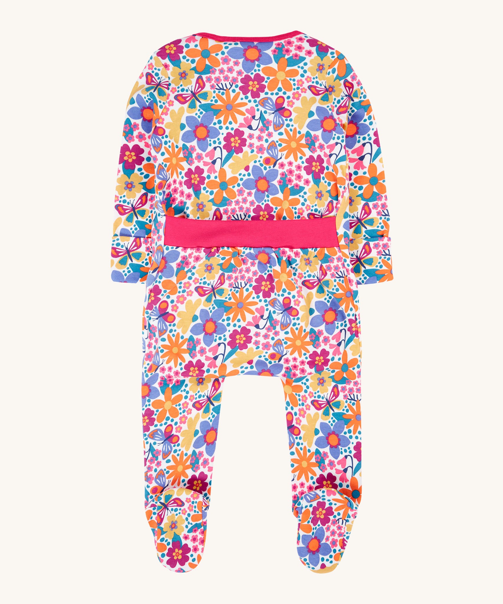 The back of the Frugi easy dressing printed babygrow in white/retro floral design available at Babipur. A GOTS organic cotton all in one with a bright retro floral design and pink trim around the waist