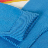 Close up of the Frugi 100% organic cotton Elwood knitted jumper in blue showing a turned up cuff
