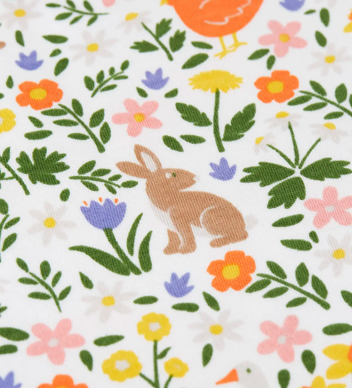 Close up of the repeating ravit, chicken and floral design on the Frugi 100% organic cotton fawn white pj set 
