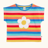 Frugi 100% organic cotton short sleeve Fiona t-shirt in rainbow stripes with a white daisy patch on the front