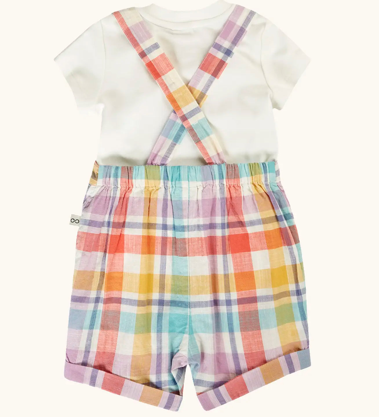 Back of Frugi 100% organic cotton Freddie outfit apastel check dungaree showing crossed shoulder straps 