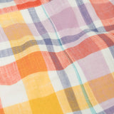 Close up of the pastel check design on the Frugi 100%  organic cotton dungarees.