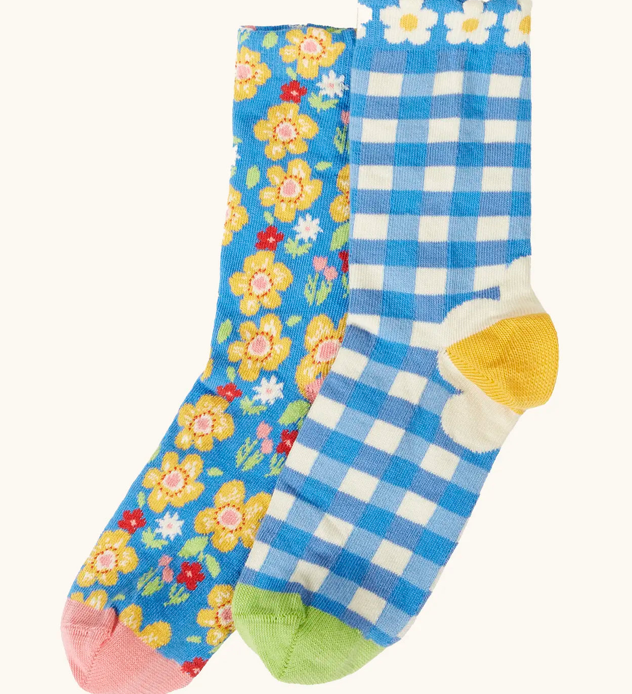Frugi 100% organic cotton kids 2 pack socks in blue with picnic inspired designs. Showing a frill around the cuff