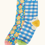 Frugi 100% organic cotton kids 2 pack socks in blue with picnic inspired designs. Showing a frill around the cuff