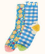 Frugi 100% organic cotton kids 2 pack socks in blue with picnic inspired designs. Showing a frill around the cuff