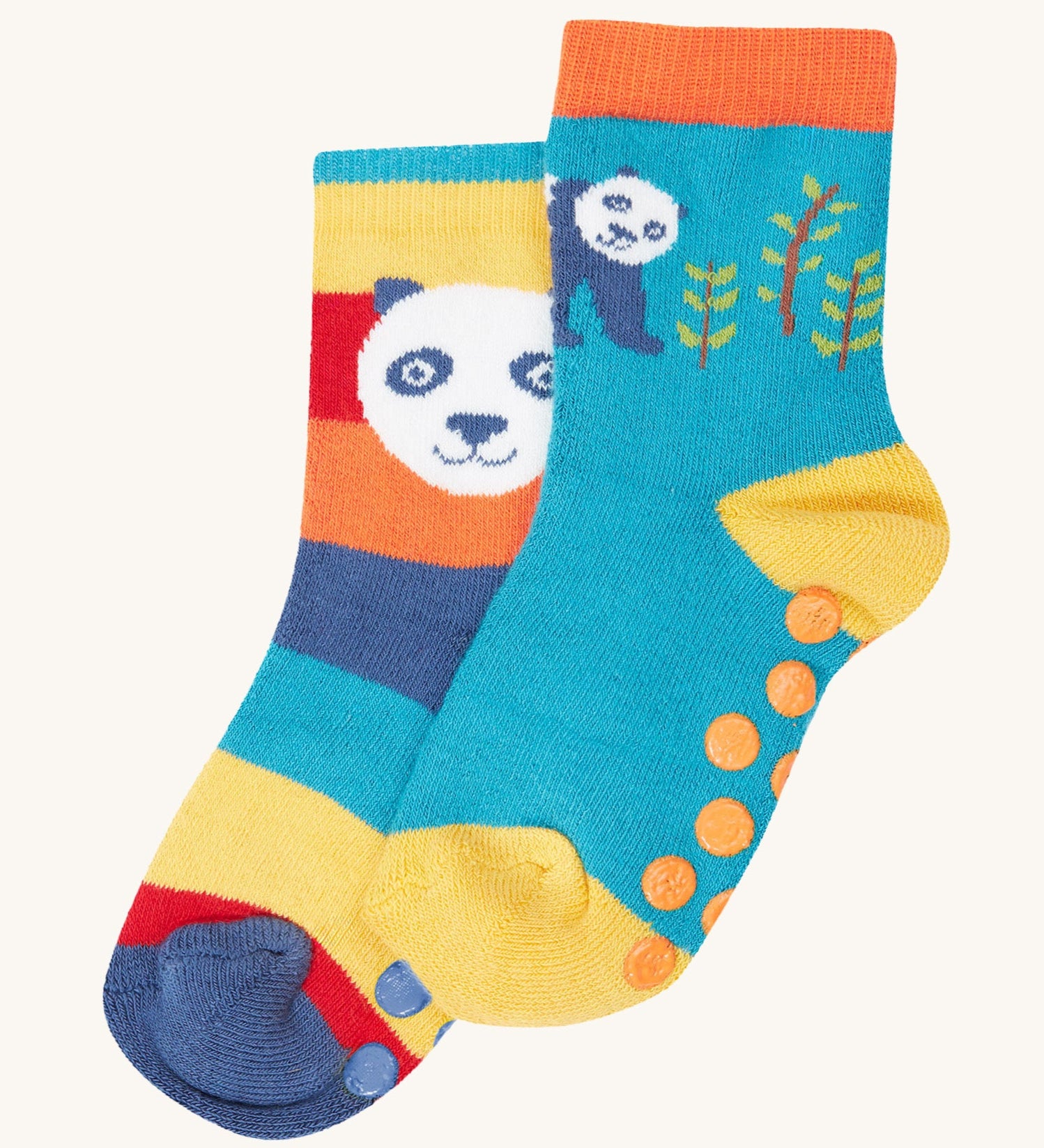 Frugi grippy 2 sock multipack in a panda design available at Babipur.  A pair of GOTS organic socks in rainbow striped and blue with a panda design. Socks features small grip panels on the heel in a shape of circles