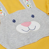 Close up of rabbit patch pocket on the front of the Frugi 100% organic cotton yellow hoodie 