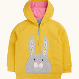 Frugi 100% organic cotton yellow hoodie with pink inner lining. Showing half length front zip and rabbit patch pocket on the front