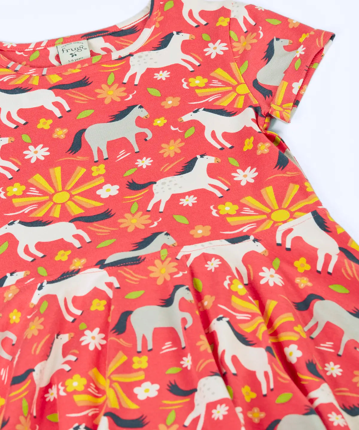 Frugi 100% spring skater dress in coral pink laid flat showing  repeating prints of grey and white horses