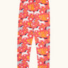 Frugi 100% organic cotton Libby leggings in coral pink with a repeating white and grey horse print design