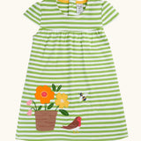 Frugi 100% organic cotton white and green striped Layla dress with a flower, robin and bee patch on the skirt 