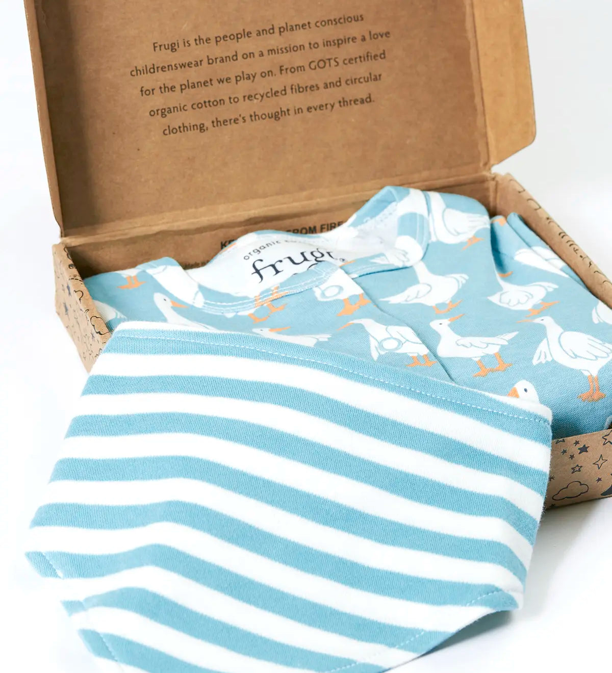 Frugi 100% organic cotton light blue baby grow with repeating white geese and a blue and white striped bib presented in a decorated box