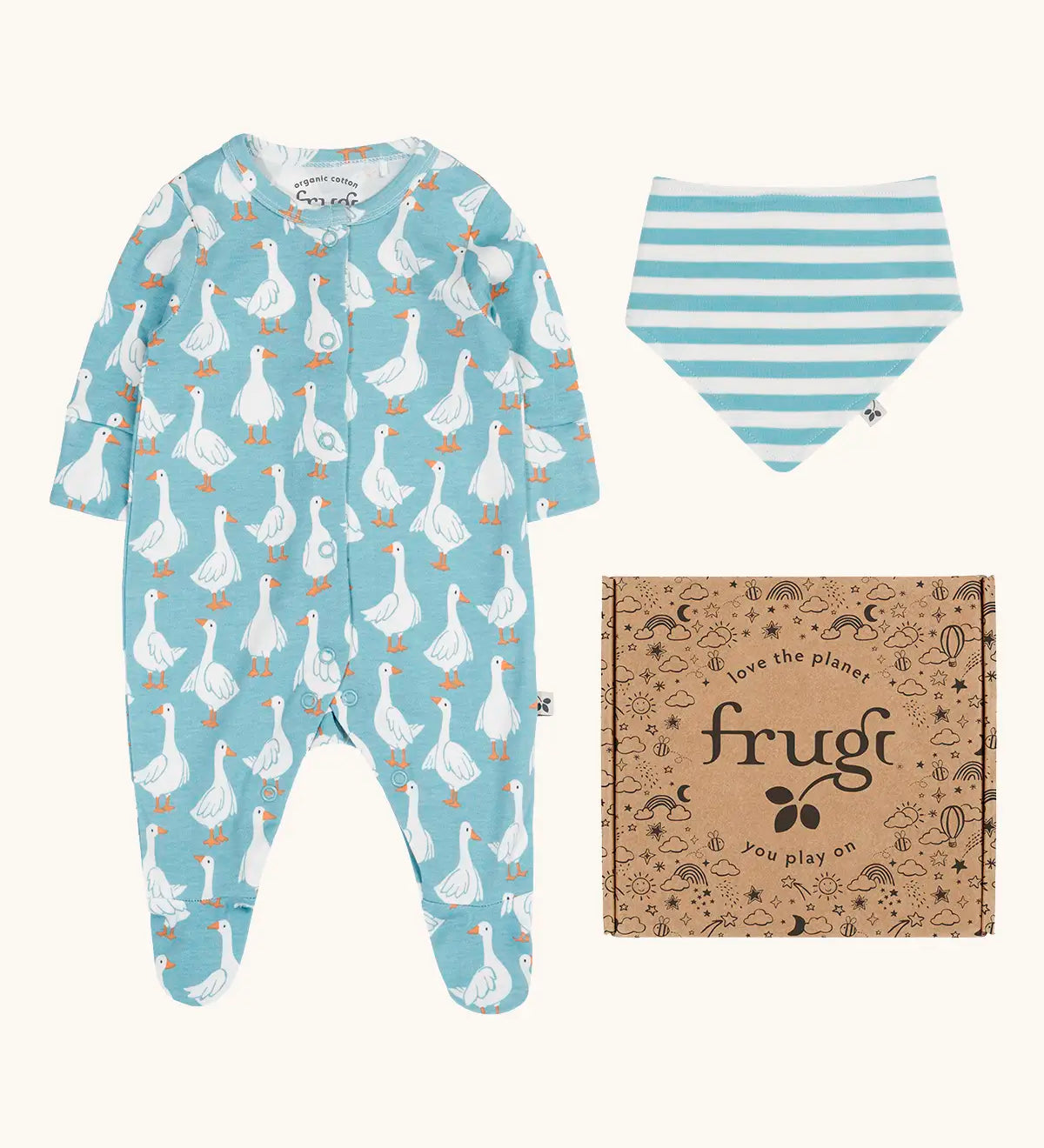 Frugi 100% organic cotton lovely gift set including a light blue with a repeating white goose baby grow and a blue and white striped bib. Shows a decorated branded box