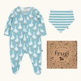 Frugi 100% organic cotton lovely gift set including a light blue with a repeating white goose baby grow and a blue and white striped bib. Shows a decorated branded box