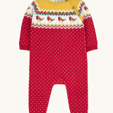 Frugi lumi knitted festive romper fair isle available at Babipur. A GOTS organic cotton soft knitted all in one in a fairisle design with robins. Features button fasteners running down from the shoulder.