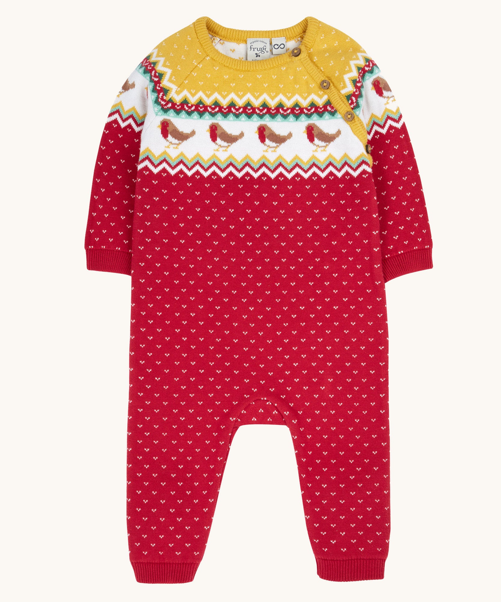 Frugi lumi knitted festive romper fair isle available at Babipur. A GOTS organic cotton soft knitted all in one in a fairisle design with robins. Features button fasteners running down from the shoulder.
