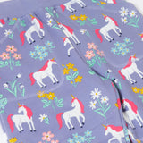 A close up of the pockets and the waistband on the Frugi malpas joggers in unicorn / floral available at Babipur. A GOTS organic cotton jogger in light purple with a playful unicorn and floral design. Features elasticated cuffs and side pockets