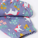 A close up of the elasticated cuffs on the Frugi malpas joggers in unicorn / floral available at Babipur. A GOTS organic cotton jogger in light purple with a playful unicorn and floral design. Features elasticated cuffs and side pockets.