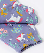A close up of the elasticated cuffs on the Frugi malpas joggers in unicorn / floral available at Babipur. A GOTS organic cotton jogger in light purple with a playful unicorn and floral design. Features elasticated cuffs and side pockets.