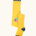 Frugi 100% organic cotton norah tights in yellow with navy waistband, heel and toe panel and a butterfly design on the knee