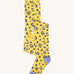 Frugi Norah tights in primrose / leopard available at Babipur. A GOTS organic cotton yellow tights with blue leopard print design and lilac contrasting heal and toe panels