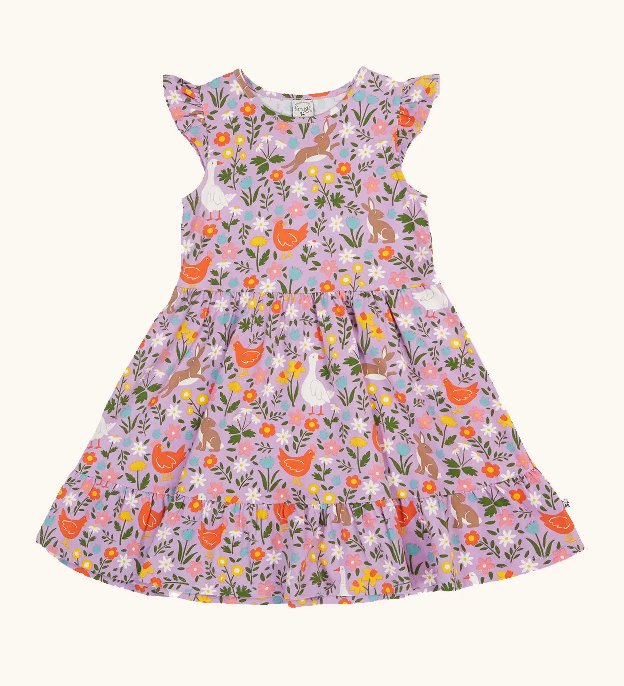 Frugi 100% organic cotton skater dress in violet purple with a repeating meadow inspired design. Shows a frill on the sleeves.