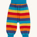 Frugi parsnip pants in big rainbow stripe available at Babipur. A GOTS organic cotton bottom in bold rainbow inspired striped design. Features blue elasticated cuffs