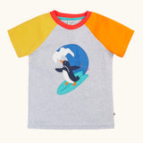 Frugi 100% organic cotton short sleeve t-shirt in grey with a yellow and orange sleeve. Showing a surfing penguin patch on the front