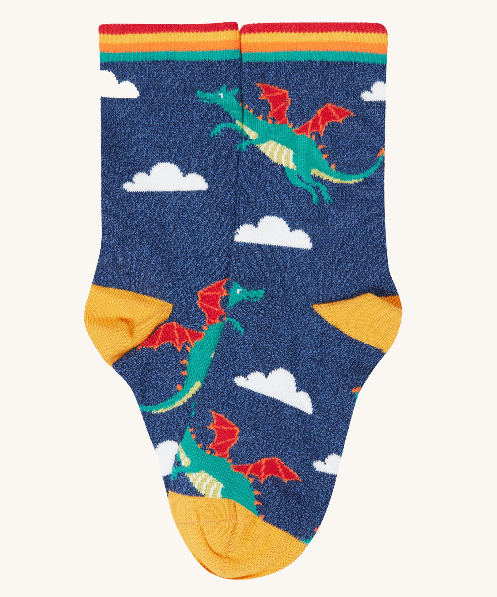 A close up of the blue sock with a green flying dragon design from the Frugi rock my socks 3 pack in dragon skies available at Babipur. 