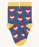 A close up of the blue and yellow with a cute robin design stock from the Frugi rock my socks 3 in festive multipack available at Babipur. 